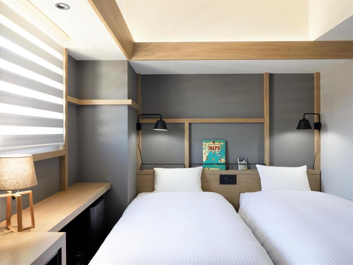Lamp Light Books Hotel Sapporo Bagian luar foto