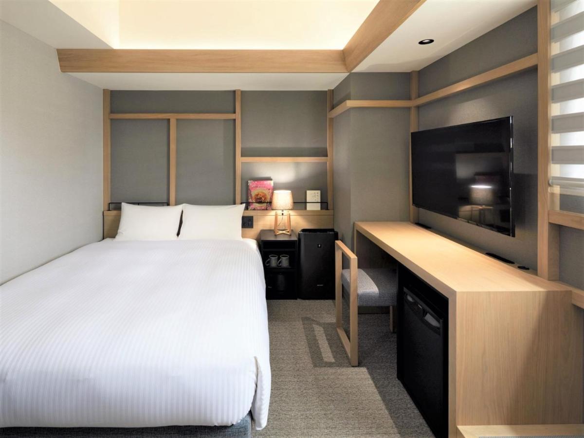 Lamp Light Books Hotel Sapporo Bagian luar foto