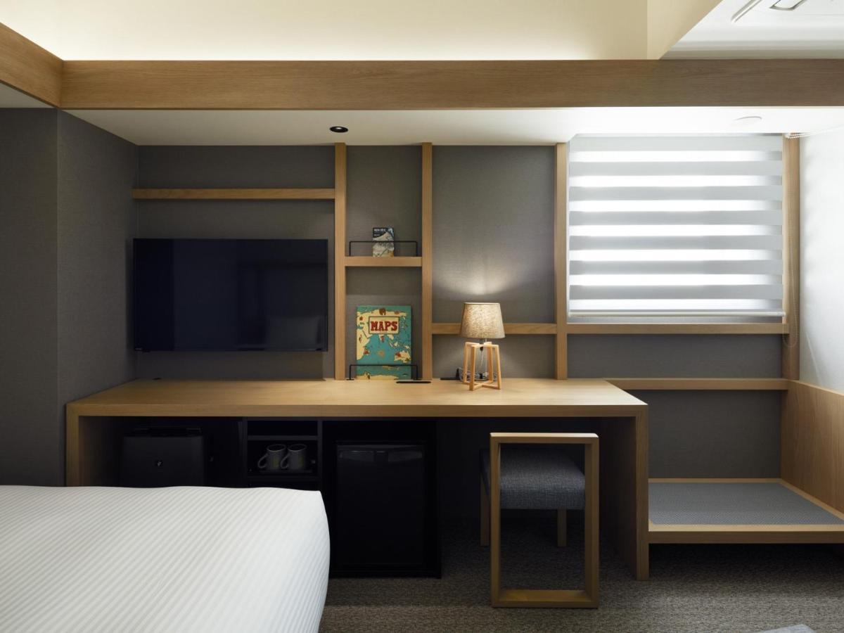 Lamp Light Books Hotel Sapporo Bagian luar foto