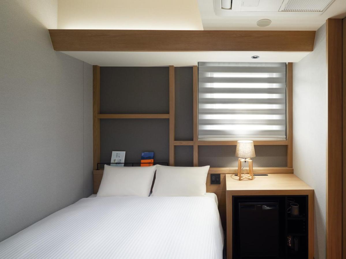 Lamp Light Books Hotel Sapporo Bagian luar foto