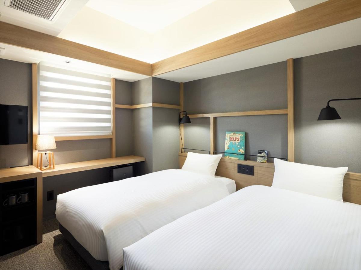 Lamp Light Books Hotel Sapporo Bagian luar foto