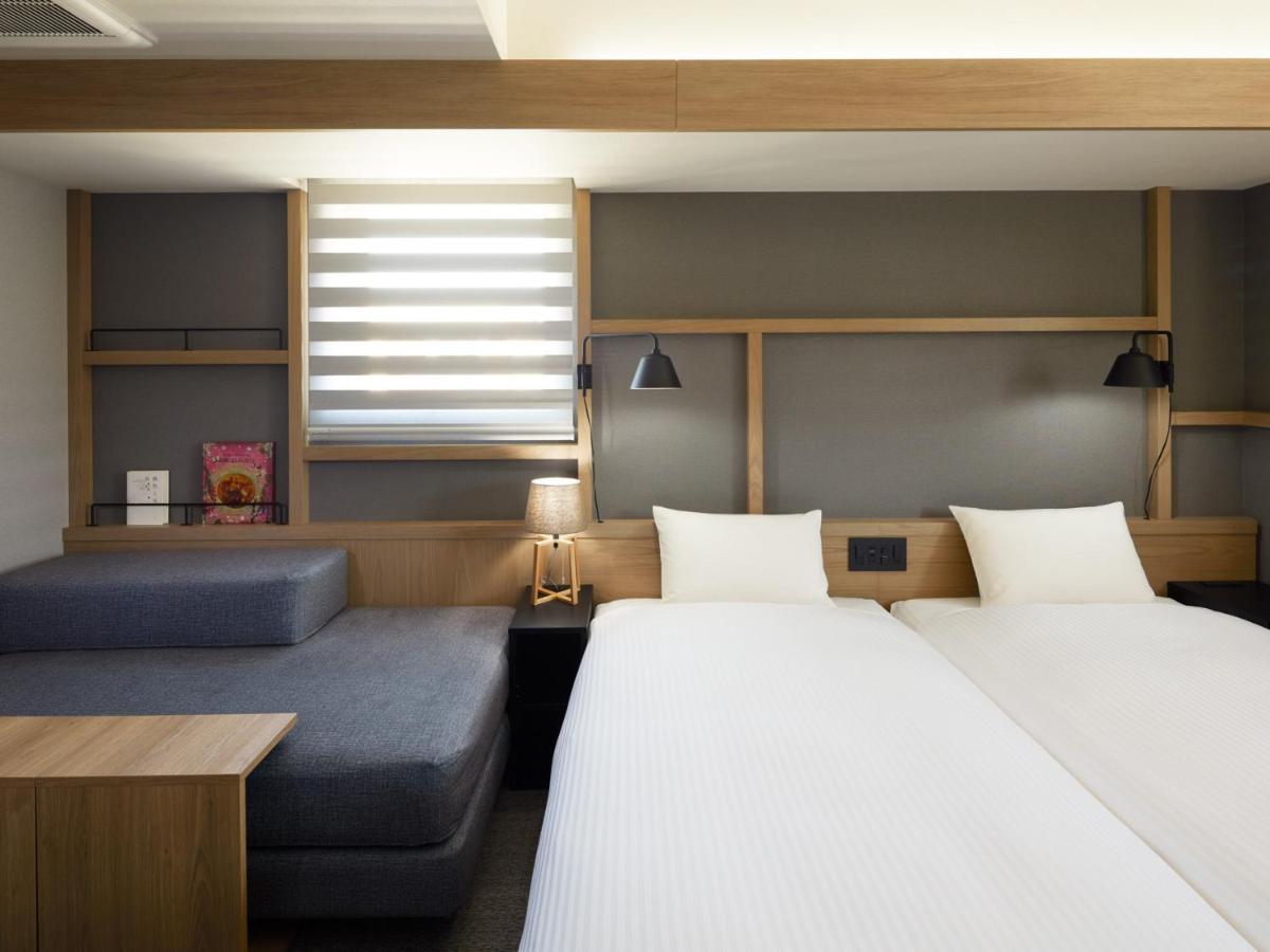 Lamp Light Books Hotel Sapporo Bagian luar foto