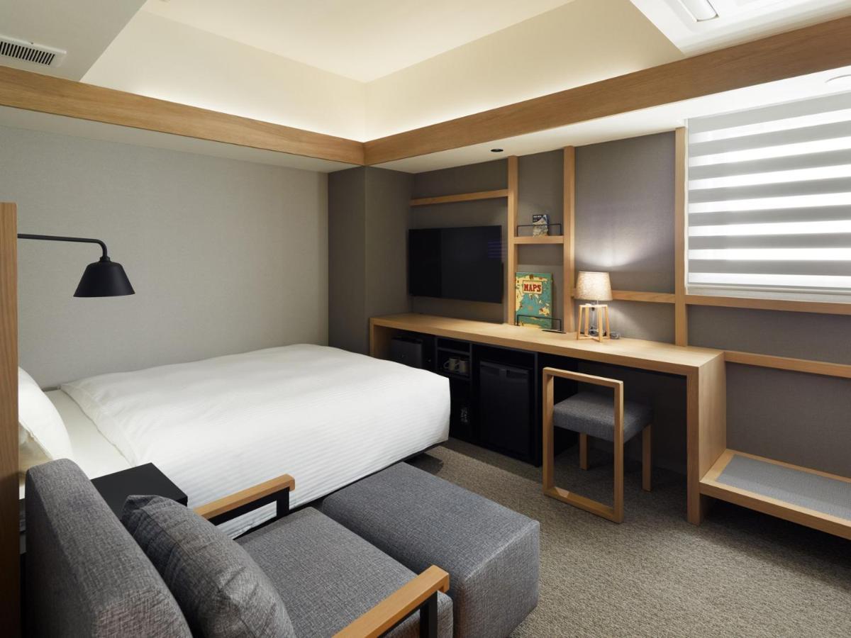 Lamp Light Books Hotel Sapporo Bagian luar foto