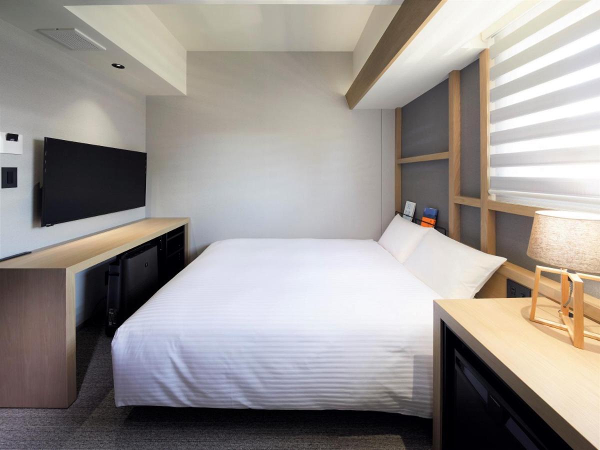 Lamp Light Books Hotel Sapporo Bagian luar foto