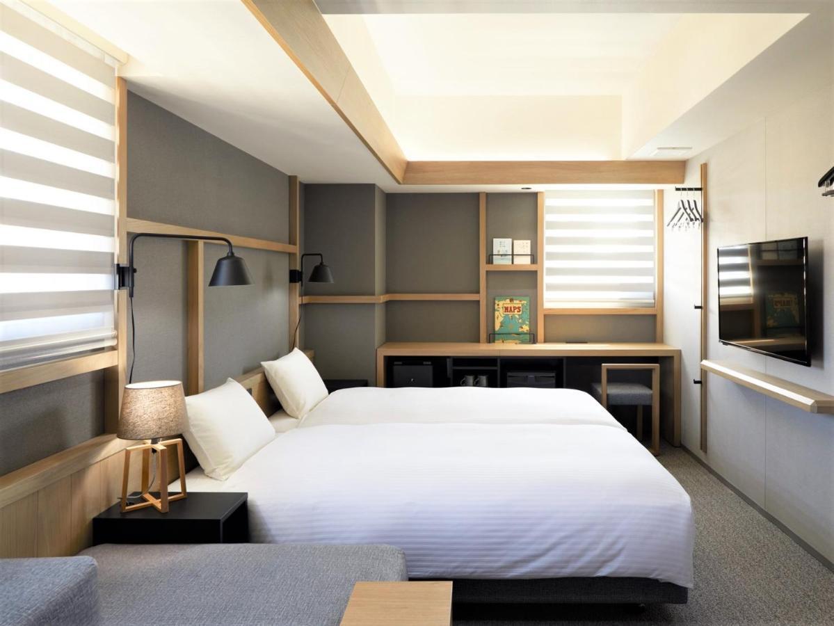 Lamp Light Books Hotel Sapporo Bagian luar foto