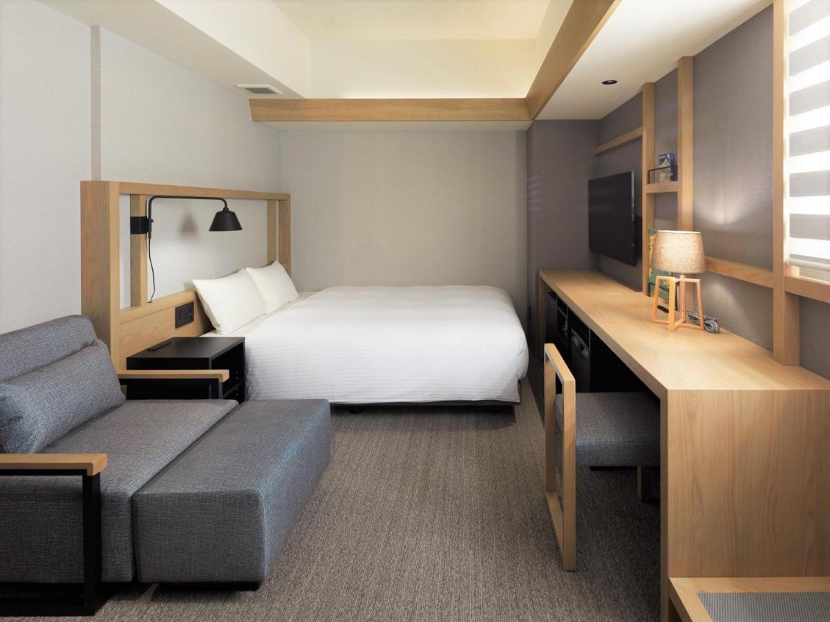 Lamp Light Books Hotel Sapporo Bagian luar foto