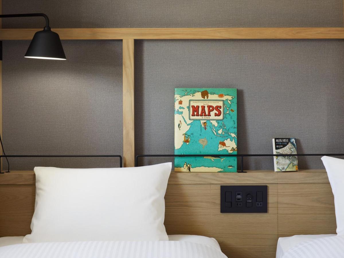 Lamp Light Books Hotel Sapporo Bagian luar foto