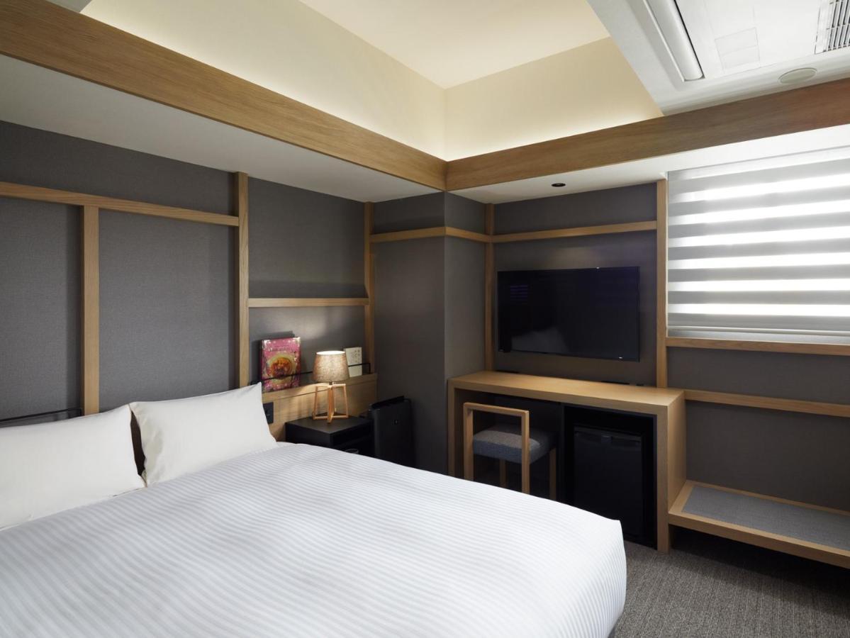 Lamp Light Books Hotel Sapporo Bagian luar foto