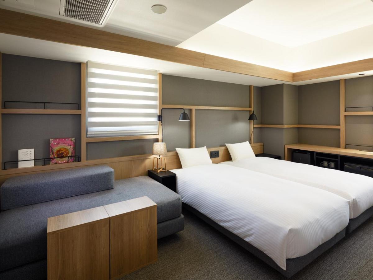 Lamp Light Books Hotel Sapporo Bagian luar foto